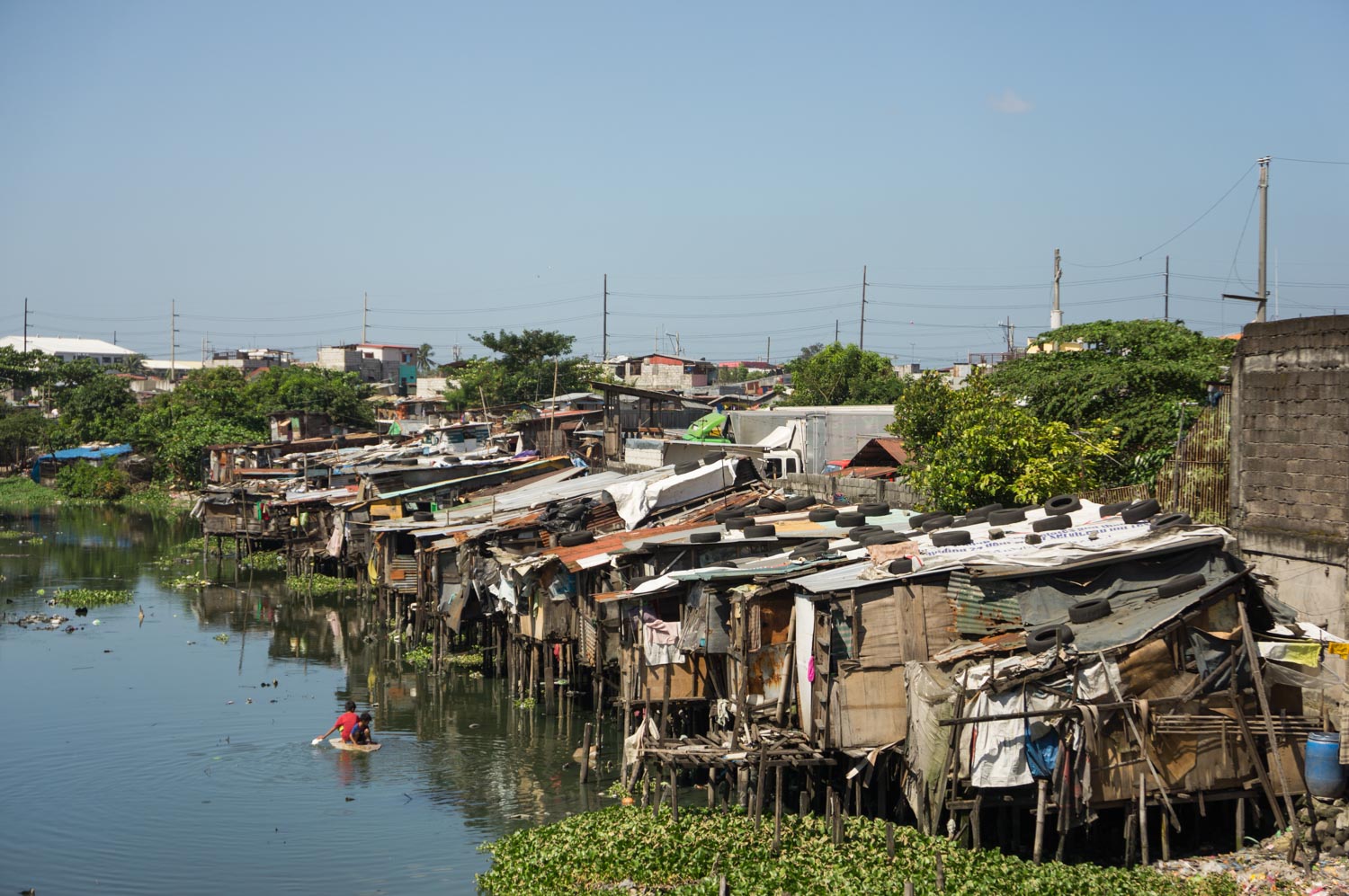 In Paranaque, these wood houses on stilts built on the river were destroyed by the government for safety reasons. The violent typhoons can make a lot of victims. 
Paranaque, Metro Manila, Philippines - 22/10/2012