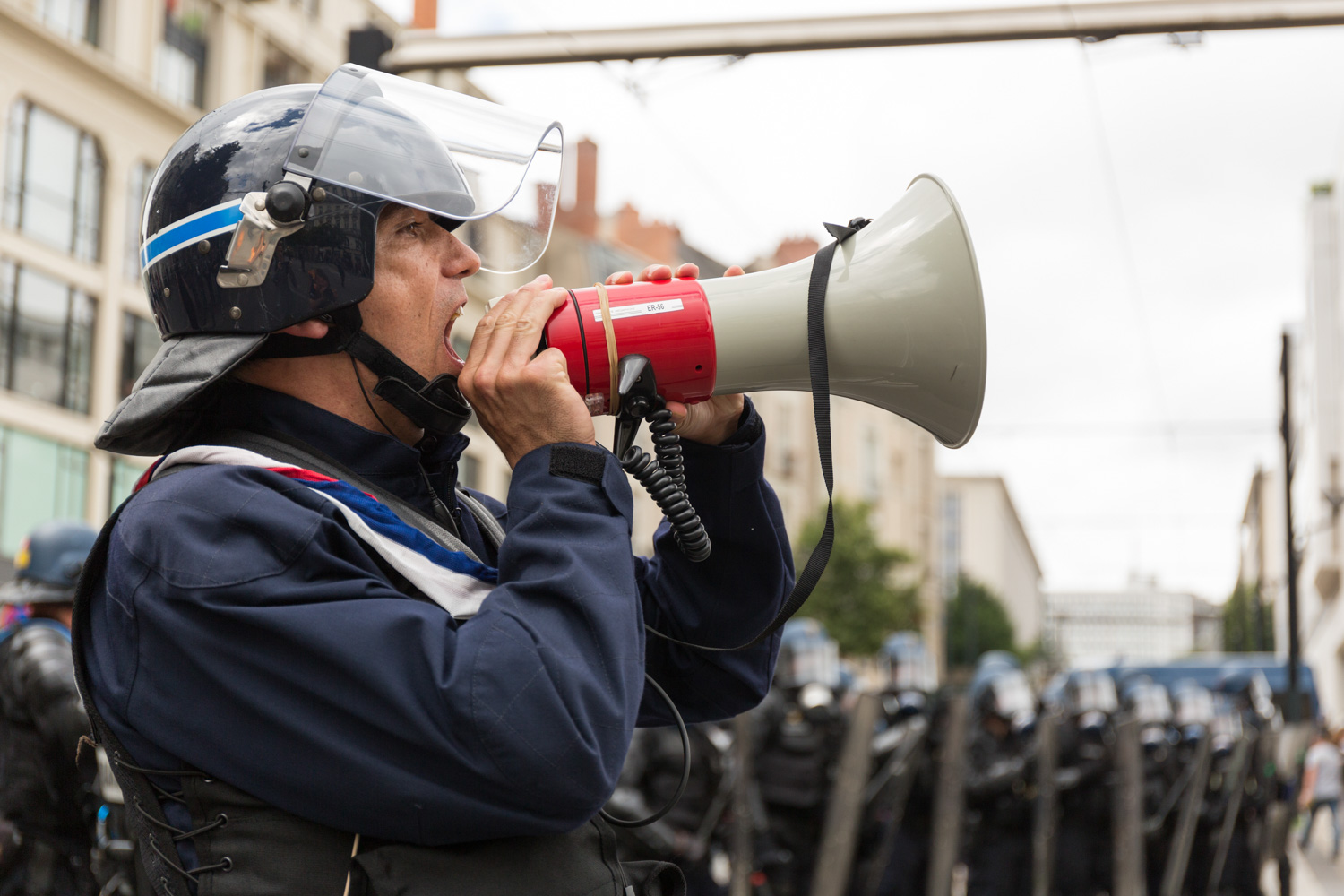 Recap of three months of social struggle against the El Khomri labour law project in Nantes during spring 2016. 
Last warning for the demonstrators. Police can now use force anytime. All streets are blocked and Policemen are almost as numerous as the protesters.          
Nantes, France - 28/06/2016. 

Retour sur trois mois de mouvements sociaux contre le projet de loi travail El Khomri à Nantes pendant le printemps 2016. 
Dernière sommation pour les manifestants. La Police peut faire usage de la force à tout moment. Toutes les rues sont bloquées et la Police est presque aussi nombreuse que les manifestants.     
Nantes, France - 28/06/2016.