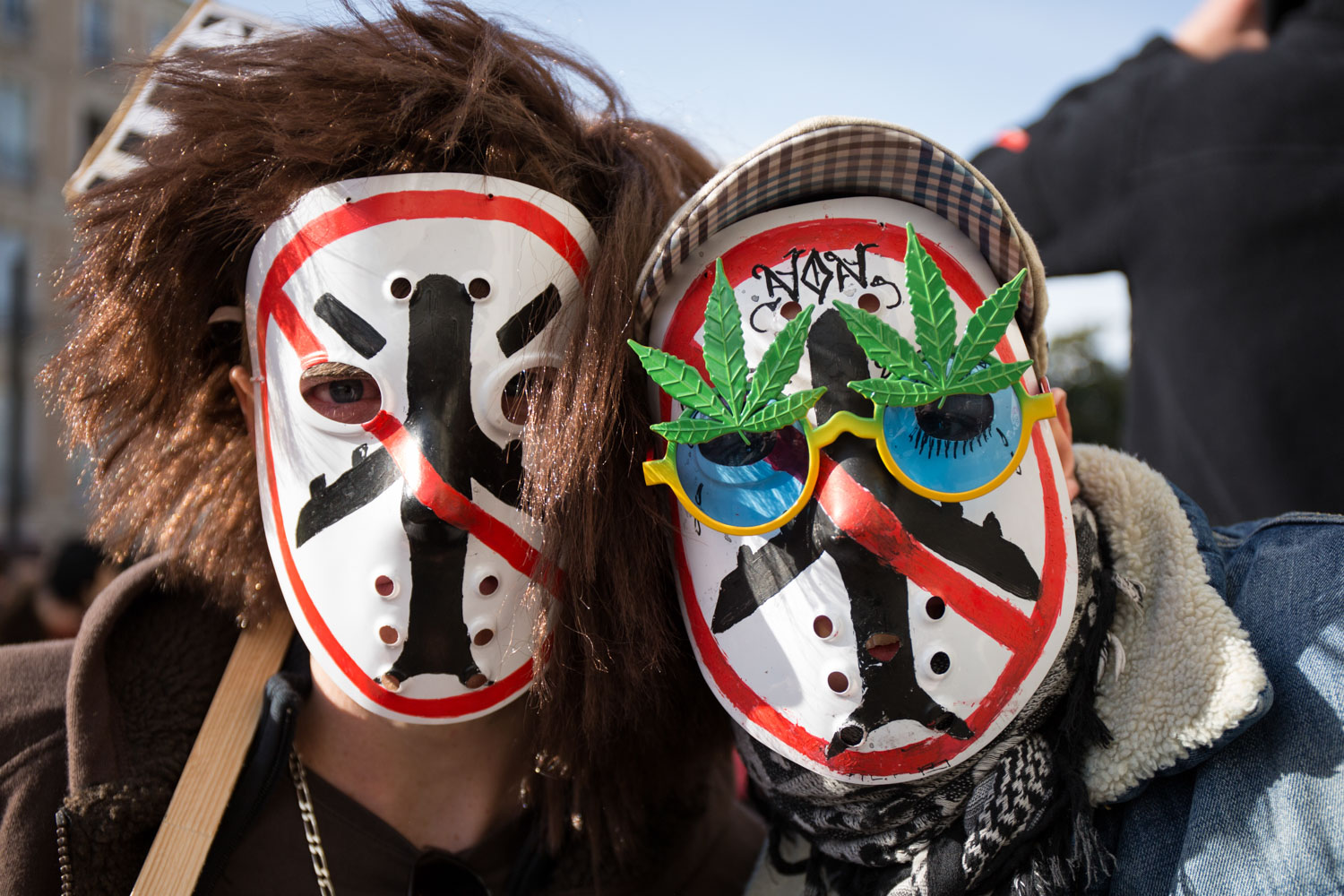 Two demonstrators against the construction project of the new airport of Notre-Dame-des-Landes in the town-center of Nantes during a demonstration. 
Nantes, France - 22/02/2014.

Deux manifestants contre l'aéroport de Notre-Dame-des-Landes dans le centre-ville de Nantes lors d'une manifestation.
Nantes, France - 22/02/2014.